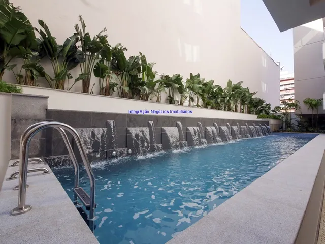Imagem 1: Condomínio com área de lazer completa com sauna, salão gourmet, piscina com raia