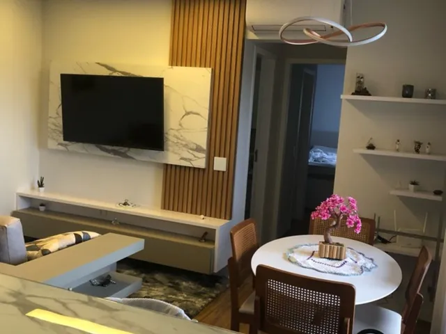 Imagem: O apartamento possui 2 Dormitórios, 1 Suíte, 2 Banheiros,