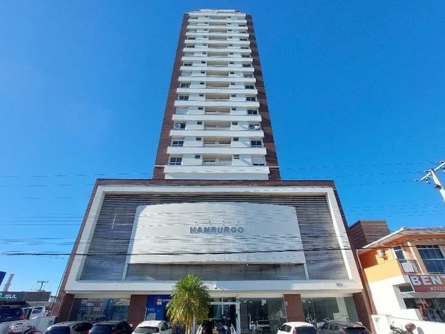 Imagem: O apartamento possui 2 Dormitórios, 1 Suíte, 2 Banheiros,