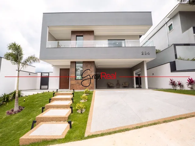 Imagem: A casa em condomínio possui 3 Dormitórios, 3 Suítes, 5