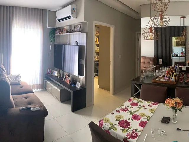 Imagem: O apartamento possui 2 Dormitórios, 1 Suíte, 2 Banheiros,