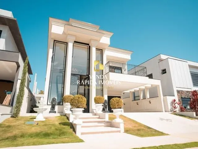 Imagem: A casa possui 3 Dormitórios, 3 Suítes, 4 Banheiros, 4