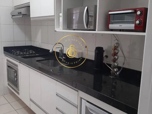 Imagem: O apartamento possui 2 Dormitórios, 1 Suíte, 1 Banheiro,