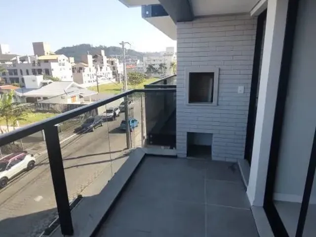 Imagem: O apartamento possui 2 Dormitórios, 1 Suíte, 2 Banheiros,