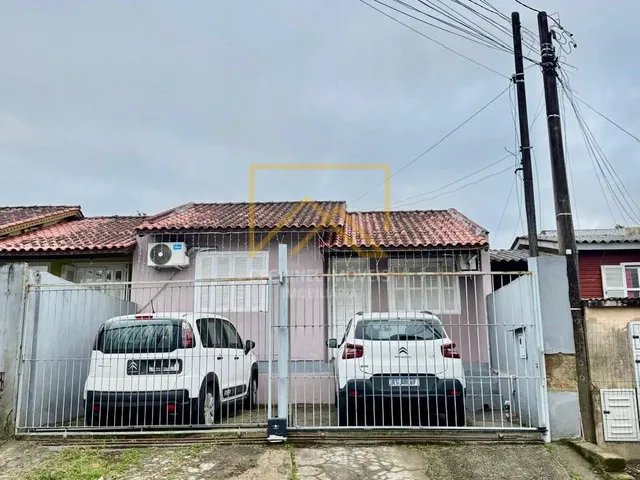 Imagem: A casa possui 2 Dormitórios, 1 Banheiro, 2 Vagas na