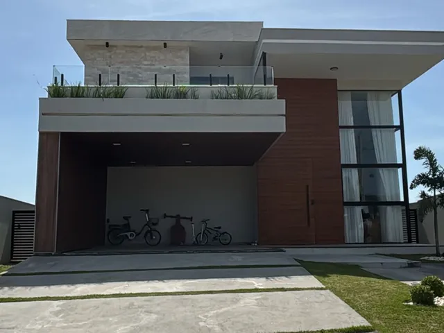 Imagem: A casa possui 4 Dormitórios, 3 Suítes, 4 Banheiros, 2