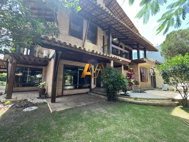 Imagem: A casa em condomínio possui 5 Dormitórios, 5 Suítes, 6