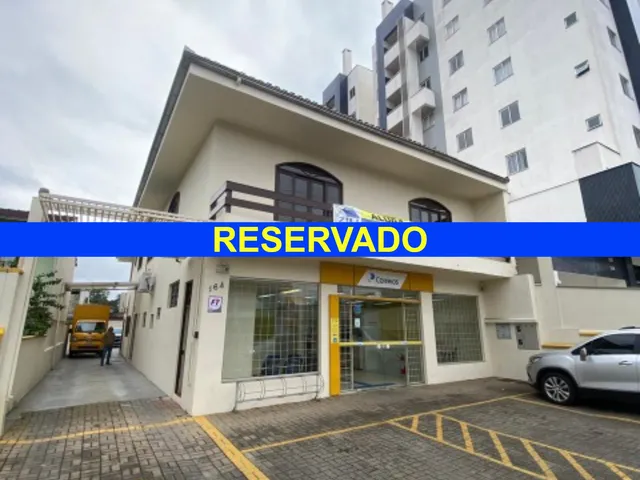 Imagem: O apartamento possui 2 Dormitórios, 1 Suíte, 2 Banheiros,