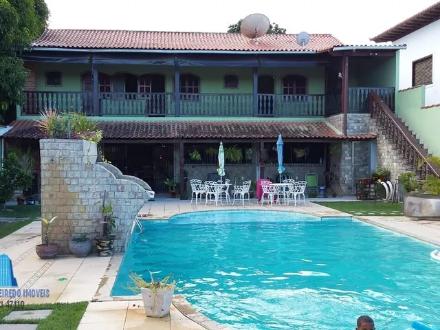 Imagem: A casa possui 4 Dormitórios, 4 Suítes, 5 Banheiros,
