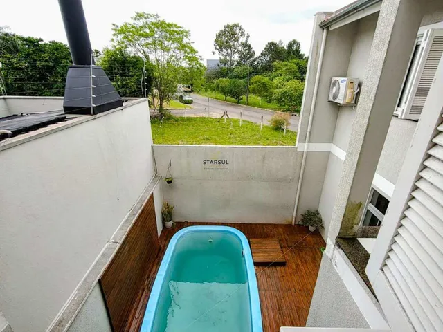 Imagem 4: Sobrado À Venda em Canoas, Estância Velha, com 3 Quartos, 218M²