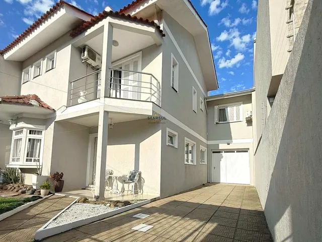 Imagem 2: Sobrado À Venda em Canoas, Estância Velha, com 3 Quartos, 218M²