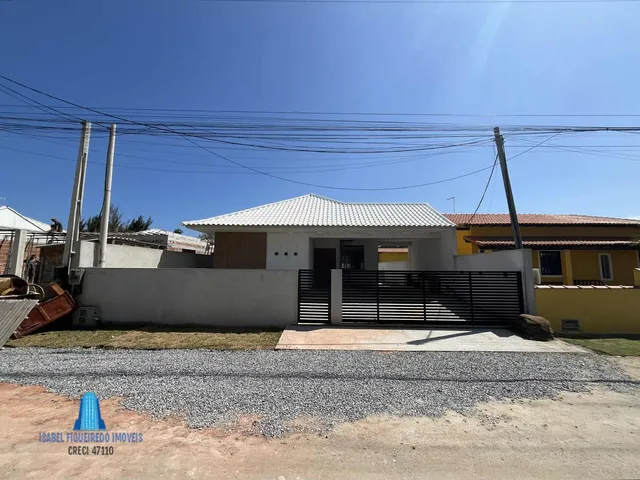 Imagem: A casa possui 3 Dormitórios, 1 Suíte, 2 Banheiros, 2