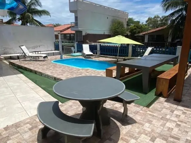 Imagem: Casa de Temporada com Piscina e Churrasqueira