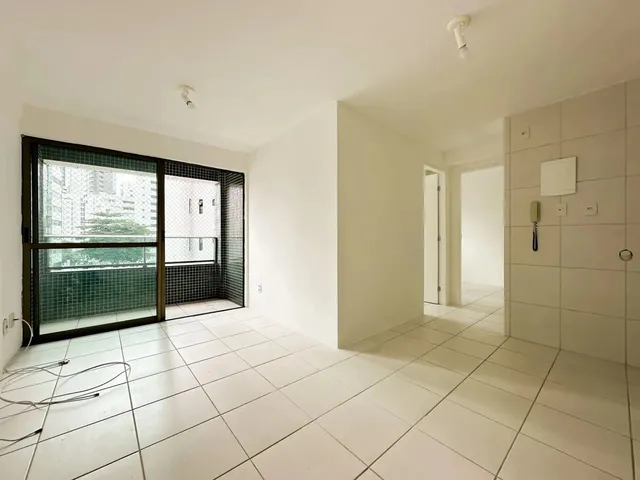 Imagem: O apartamento possui 2 Dormitórios, 1 Suíte, 2 Banheiros,