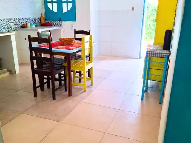 Imagem 6: Refúgio Perfeito com Piscina e Churrasqueira Perto do Mar