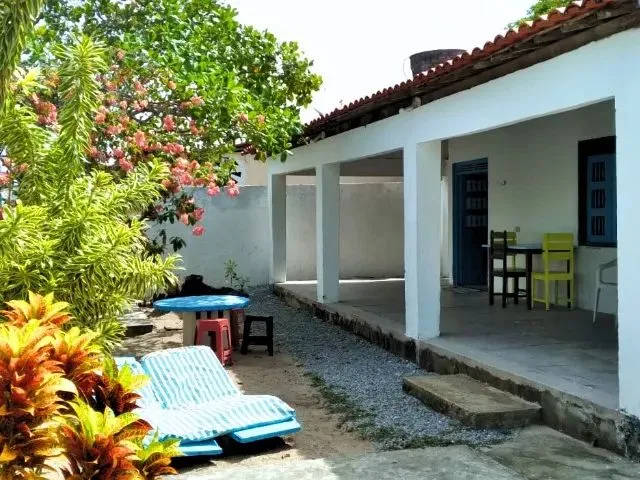 Imagem 3: Refúgio Perfeito com Piscina e Churrasqueira Perto do Mar
