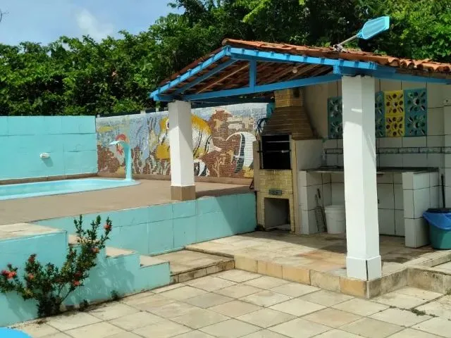 Imagem 11: Refúgio Perfeito com Piscina e Churrasqueira Perto do Mar