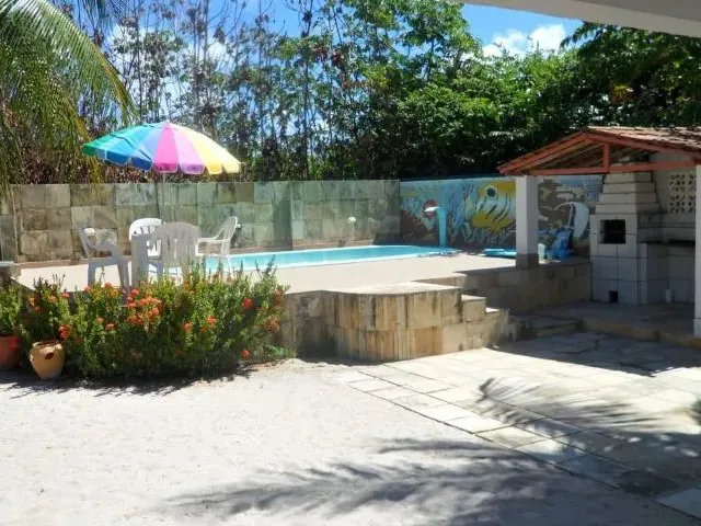 Imagem 16: Refúgio Perfeito com Piscina e Churrasqueira Perto do Mar