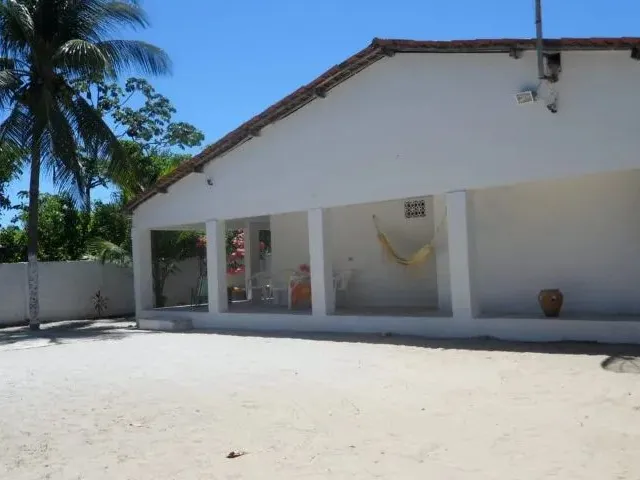 Imagem 15: Refúgio Perfeito com Piscina e Churrasqueira Perto do Mar