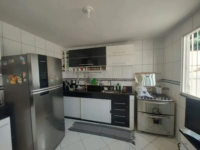 Imagem: A casa possui 3 Dormitórios, 2 Suítes, 4 Banheiros, 3