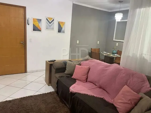 Imagem: O apartamento possui 2 Dormitórios, 1 Suíte, 2 Banheiros,