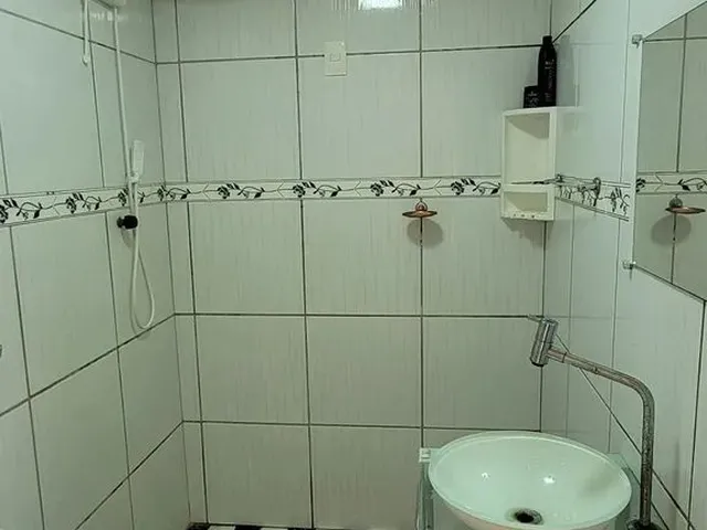Imagem 11: Casa no Primeiro Andar, 3 Quartos, 1 Banheiros e Área de Serviço