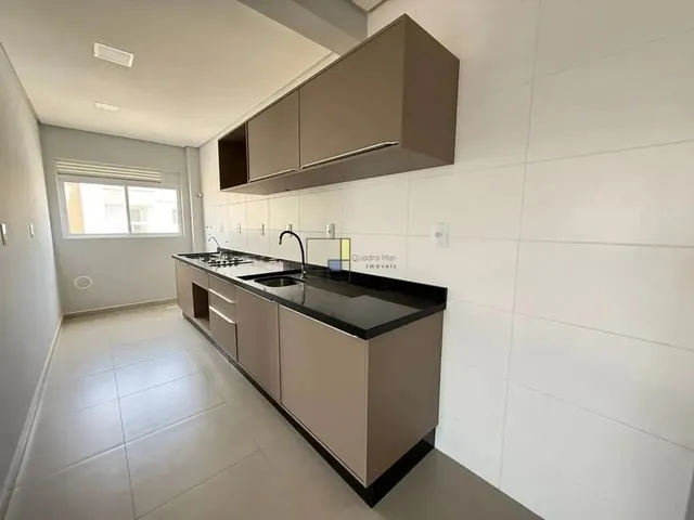 Imagem: O apartamento possui 2 Dormitórios, 1 Suíte, 2 Banheiros,