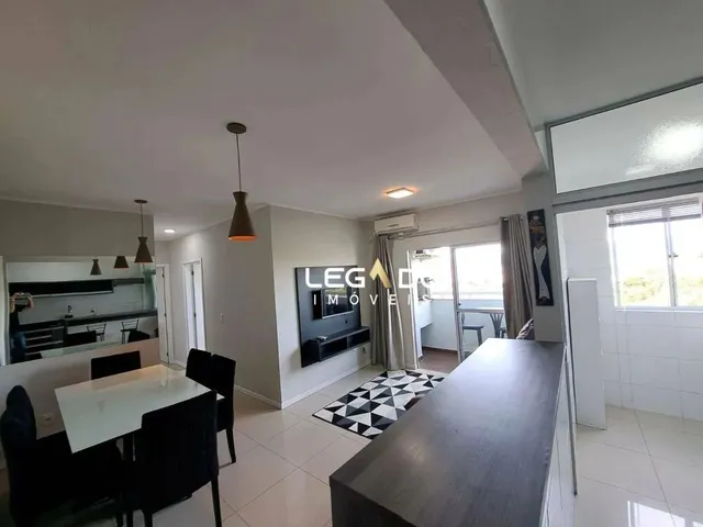 Imagem: O apartamento possui 2 Dormitórios, 1 Suíte, 2 Banheiros,
