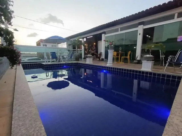Imagem: A casa possui 3 Dormitórios, 3 Suítes, 4 Banheiros, 3