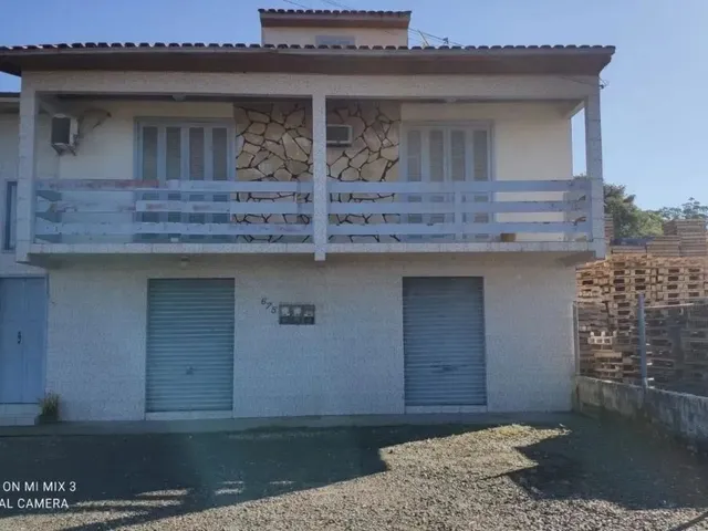 Imagem: Prédio Comercial com Um Apartamento na