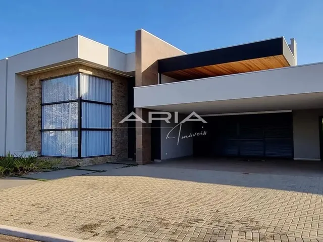 Imagem: A casa em condomínio possui 4 Dormitórios, 4 Suítes, 5