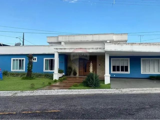 Imagem: A casa em condomínio possui 4 Dormitórios, 4 Suítes, 5