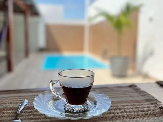 Imagem 3: Uma Linda Casa com Piscina e Ar Condicionado a 2 Minutos do Mar