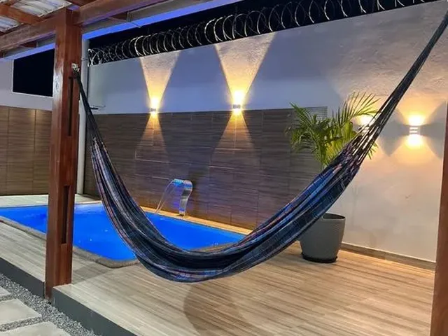 Imagem 6: Uma Linda Casa com Piscina e Ar Condicionado a 2 Minutos do Mar