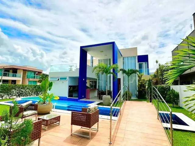 Imagem: A casa em condomínio possui 5 Dormitórios, 5 Suítes, 5