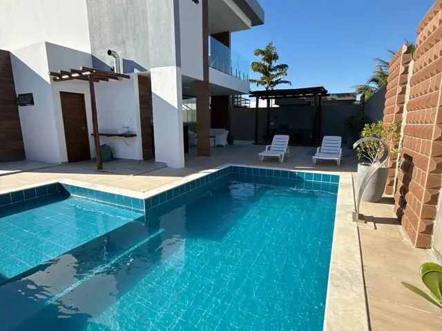 Imagem: A casa em condomínio possui 4 Dormitórios, 3 Suítes, 4
