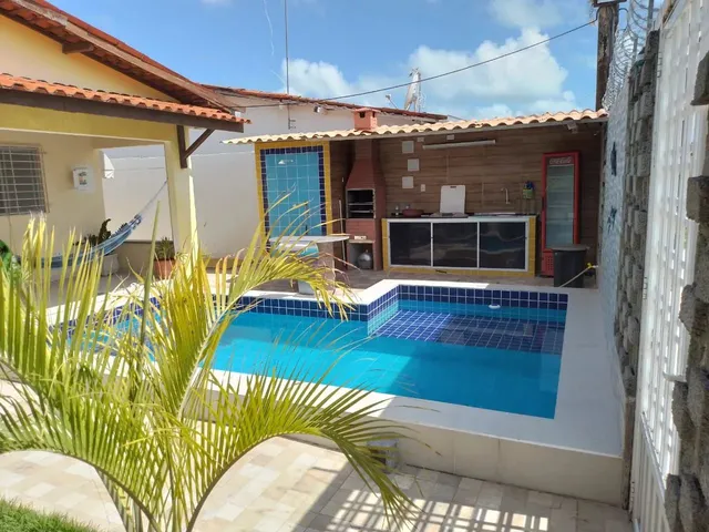 Imagem: A casa possui 5 Dormitórios, 3 Suítes, 5 Banheiros, 2