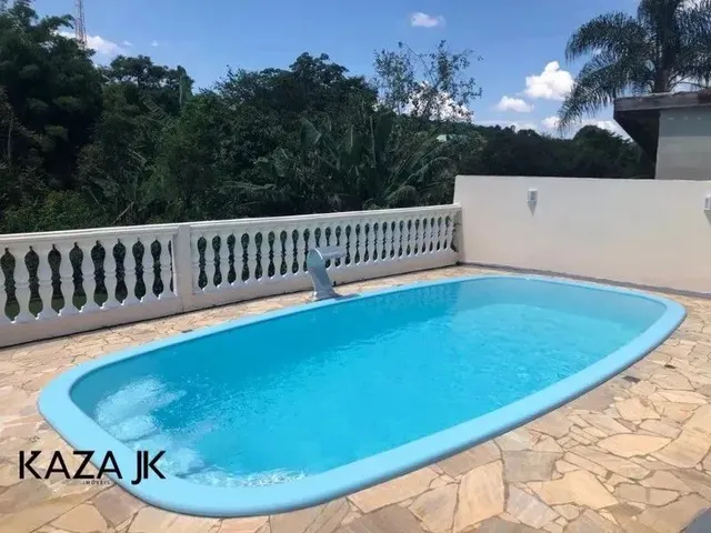 Imagem: A casa possui 2 Dormitórios, 2 Banheiros, 4 Vagas na