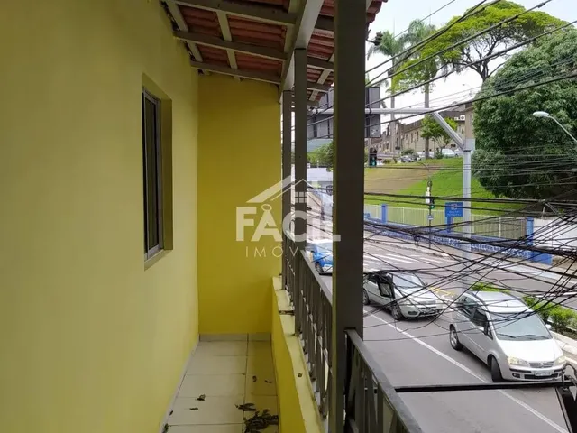 Imagem: Prédio Residencial e Lojas Comerciais em