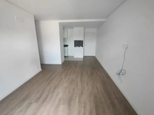 Imagem: O apartamento possui 1 Dormitório, 1 Banheiro, 1 Vaga na