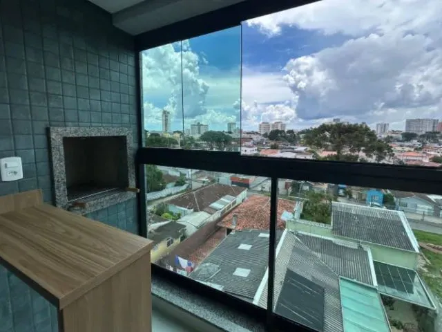 Imagem 4: Apartamento com Sacada e Churrasqueira no Portão