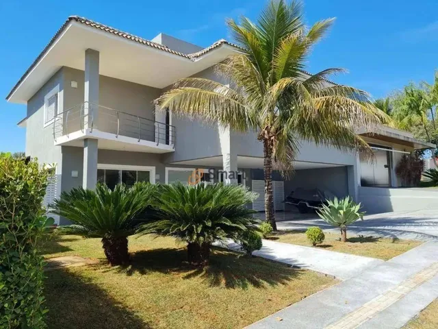 Imagem: A casa possui 4 Dormitórios, 4 Suítes, 5 Banheiros, 5
