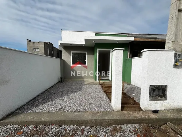 Imagem: A casa possui 2 Dormitórios, 1 Suíte, 2 Banheiros, 1 Vaga