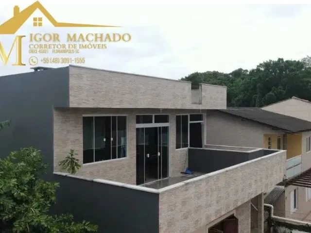Imagem: A casa possui 4 Dormitórios, 1 Suíte, 3 Banheiros, 2