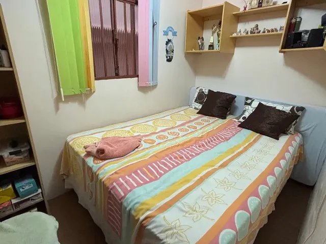 Imagem: A casa possui 3 Dormitórios, 2 Banheiros, 3 Vagas na