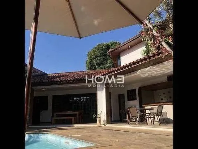 Imagem: A casa possui 5 Dormitórios, 4 Suítes, 5 Banheiros, 3