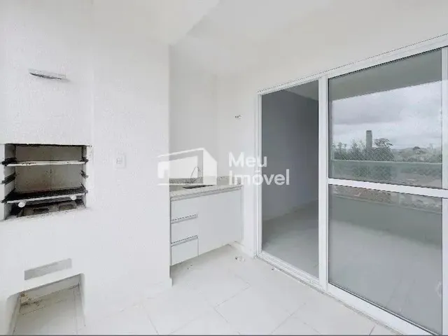 Imagem: O apartamento possui 2 Dormitórios, 1 Suíte, 2 Banheiros,