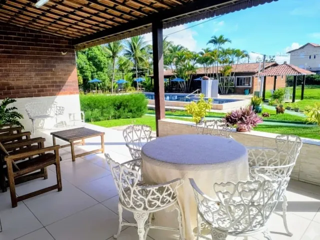 Imagem: A casa em condomínio possui 5 Dormitórios, 5 Banheiros,