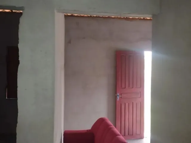 Imagem: Um Terreno com Uma Casa com Documento Frente