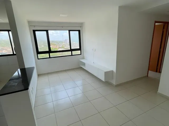 Imagem: O apartamento possui 2 Dormitórios, 1 Suíte, 2 Banheiros,